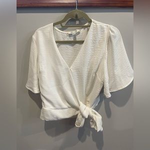 Women’s white wrap flutter sleeve blouse